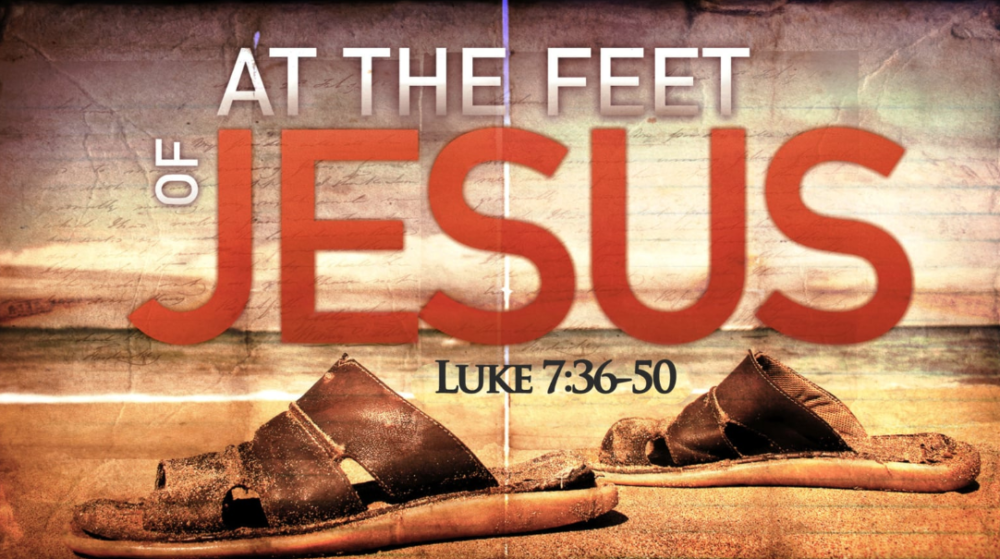 At the Feet of Jesus Image